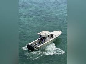 A boat navigates through clear waters with passengers onboard, showcasing an exciting day on the water.