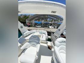 A spacious interior view of a Sea Ray boat featuring comfortable seating, perfect for relaxing during a day on the water.