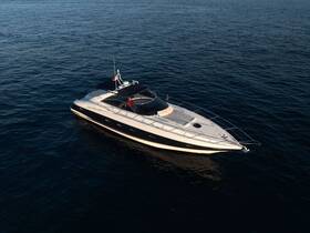 A stunning aerial view of a sleek yacht cruising through deep blue waters, showcasing its elegant design and perfect for luxury outings.