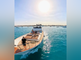 A joyful group enjoys a sunny day aboard a luxurious yacht, creating unforgettable memories on the water.