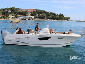 A lively group enjoys a private boat tour on the water, showcasing the perfect blend of relaxation and adventure in a scenic setting.