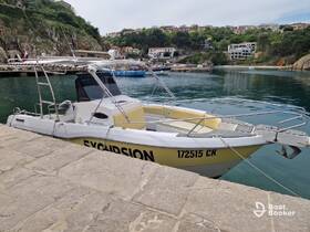 A sleek boat named 'Excursion' docked at a serene harbor, surrounded by lush greenery and picturesque buildings, perfect for exploring coastal waters.
