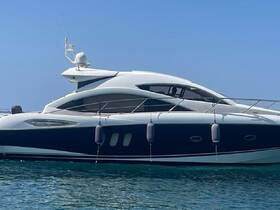 A sleek yacht is docked in clear waters, showcasing its elegant design and modern features — perfect for luxury charters and private getaways.