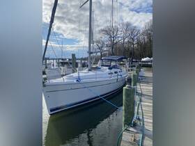 A beautiful sailboat docked at the marina, showcasing its sleek design and ready for the next adventure on the water.