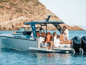 A lively group enjoys a relaxing day on a stylish boat, celebrating with drinks and soaking up the sun — perfect for summer outings and boat parties.