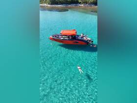 A vibrant scene featuring a group enjoying a day on the water, with a sleek boat and a swimmer in the crystal-clear sea — perfect for summer adventures and water activities.