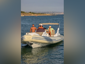 A family enjoys a sunny day on the water aboard a sleek boat, perfect for summer adventures and creating lasting memories.