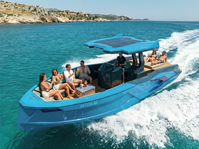 A lively group enjoys refreshing cocktails aboard a stylish boat, perfect for summer outings and celebrations on the water.