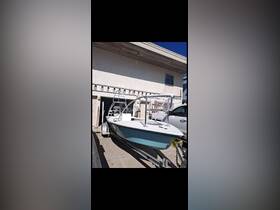 A center console boat docked and ready for adventure, showcasing its sleek design and features.