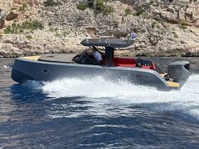 A sleek speedboat glides through clear waters, showcasing its modern design and powerful performance — perfect for thrilling adventures on the sea.