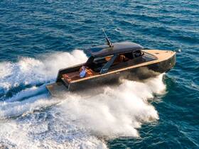 A sleek yacht speeds through the waves with a guest relaxing on deck, showcasing the thrill of luxury boating adventures.