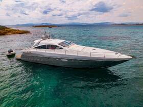 A stunning aerial view of a sleek yacht anchored in crystal-clear waters, showcasing its elegant design and perfect for luxury charters.