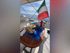 A beautifully arranged table on a boat featuring an assortment of snacks and drinks, perfect for enjoying a relaxing day on the water.