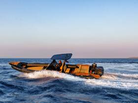A speedboat navigates through the waves, showcasing a thrilling on-water experience. Perfect for adventure seekers looking to explore the open sea.