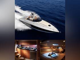 A couple enjoys a thrilling ride on a sleek speedboat, cutting through the deep blue waters — an exhilarating experience for boating enthusiasts.