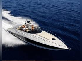 A dynamic shot of a speedboat cruising through deep blue waters with a group onboard, showcasing the thrill of a day on the water.