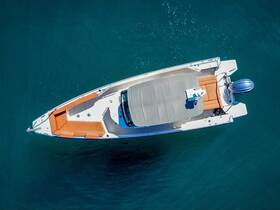 Aerial view of a sleek speedboat showcasing its stylish design and spacious seating, perfect for thrilling adventures on the water.