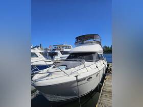 A stunning yacht docked at the marina, showcasing its sleek design and inviting atmosphere under a clear blue sky.
