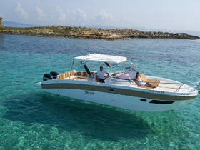 A couple enjoys a relaxing moment aboard a stylish boat in crystal-clear turquoise waters, perfect for a day of leisure and exploration.
