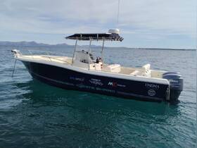 A sleek speedboat named 'White Shark' glides through clear waters, showcasing its modern design and fishing equipment — perfect for adventurous outings.