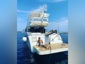 A man relaxes on the deck of a luxurious yacht, enjoying the sun and sea breeze — an ideal moment for leisure on the water.