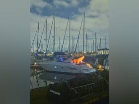 A lively scene at the marina with guests enjoying a night out on the boat 'Hawkeye' — perfect for evening celebrations and gatherings.