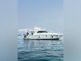 A group of people enjoying a day on the water, interacting with a boat while swimming nearby — perfect for summer adventures and aquatic fun.
