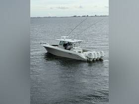 A sleek speedboat navigates the water, showcasing its powerful design and fishing equipment, perfect for adventurous outings on the sea.