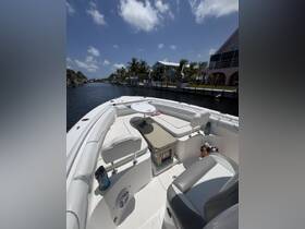 Interior view of a boat's seating and helm area, showcasing a comfortable setup for cruising along scenic waterways.