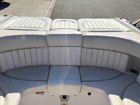 A close-up view of the plush seating area inside a boat, showcasing comfortable upholstery designed for relaxation on the water.