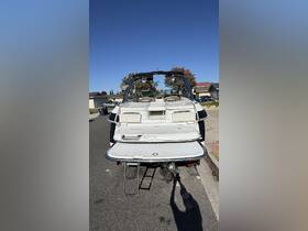 A clear view of the back of a boat, showcasing its sleek design and features, perfect for water enthusiasts looking for a stylish vessel.