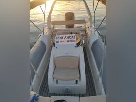 Interior view of a rental boat showcasing the seating and helm area, perfect for a day on the water with friends or family.