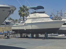 A well-maintained yacht docked in a marina, showcasing its sleek design and structure, perfect for boating enthusiasts.