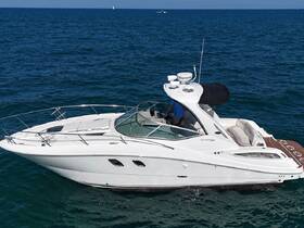 A sleek yacht cruising through clear waters, showcasing its elegant design and spacious deck — perfect for luxurious outings on the sea.