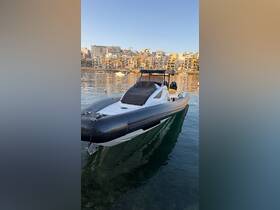 A sleek speedboat docked in calm waters, showcasing its modern design against a backdrop of urban architecture.