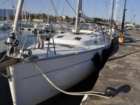A sleek yacht docked at the marina, showcasing its elegant design and ready for the next adventure on the water.