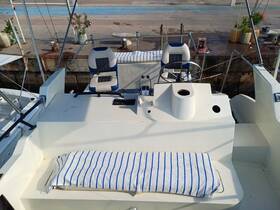 A clean and organized view of the helm and seating area inside a boat, showcasing the console and comfortable seating for a smooth sailing experience.
