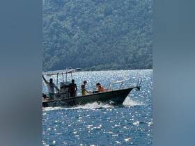 A group of friends enjoys a day on the water aboard a boat, capturing the essence of adventure and fun in the sun.