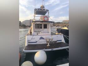 A clear view of the back of the 'GreenFish' yacht docked in a serene harbor, showcasing its elegant design and inviting atmosphere.