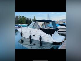 A sleek yacht docked peacefully, showcasing its elegant design and reflections in the calm water — perfect for luxury boating experiences.