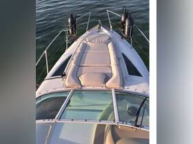 A top-down view of the comfortable seating area on a boat's helm, showcasing the inviting space for relaxation while cruising on the water.