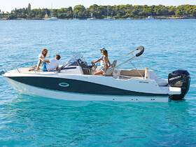 A couple enjoys a sunny day on a sleek boat, showcasing the perfect setting for a fun day on the water.