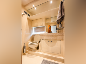 A well-appointed boat bathroom featuring modern fixtures and ample storage, ideal for comfortable cruising experiences.