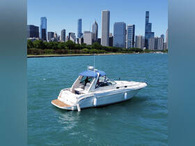 A sleek speedboat navigates the vibrant waters of Chicago, with the stunning skyline as a backdrop, perfect for city cruising.