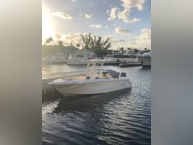 A sleek speedboat docked at a marina, surrounded by other vessels and a picturesque sunset, perfect for a day on the water.