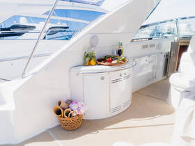 An elegant display of snacks and cocktails on a yacht, perfect for entertaining guests while enjoying a day on the water.