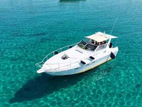 Aerial view of a group enjoying a day on a boat in crystal-clear waters, perfect for summer adventures and group outings.