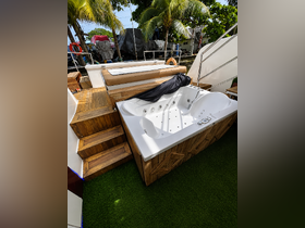 A luxurious outdoor jacuzzi on a boat, perfect for relaxation and enjoyment while cruising. Ideal for adding a touch of comfort to your boating experience.