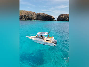 Snorkel, Swim & Sunset – Private Boat Tour
