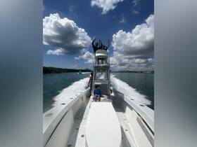 A lively group enjoys a fun day on the water, celebrating aboard a boat with smiles and excitement — perfect for family outings or group adventures.